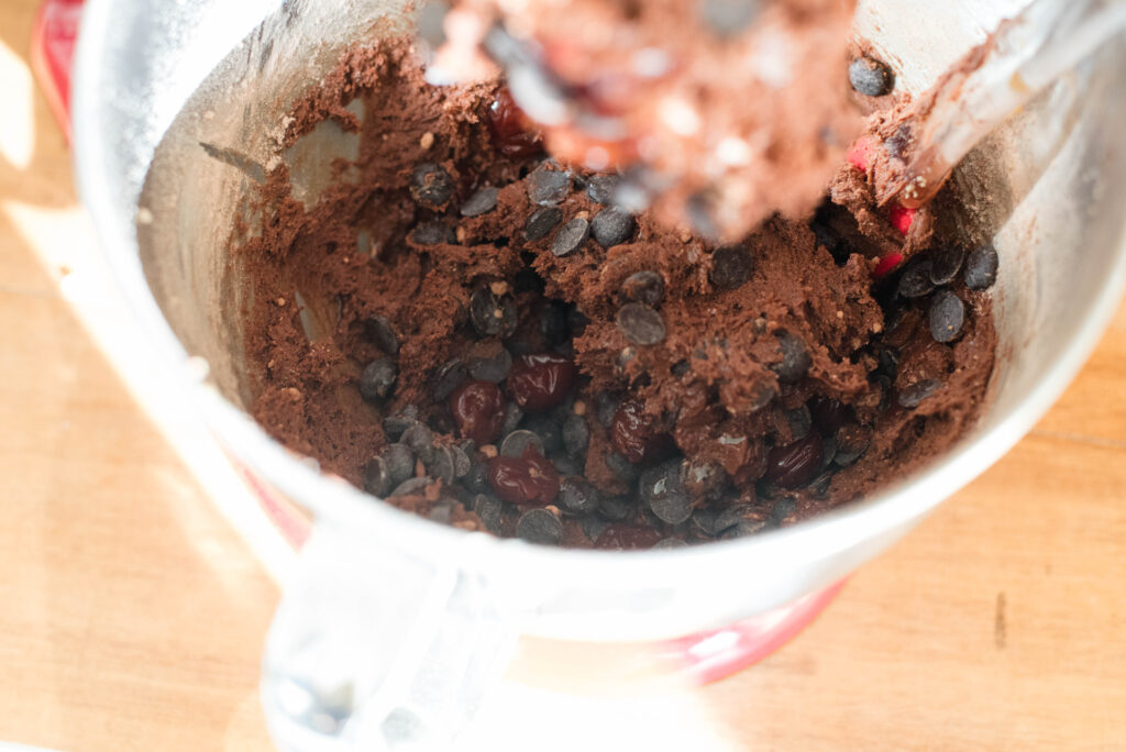 cherries and chocolate chips added to cookie dough