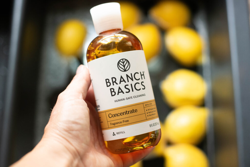 lemons being washed in sink with Branch Basics