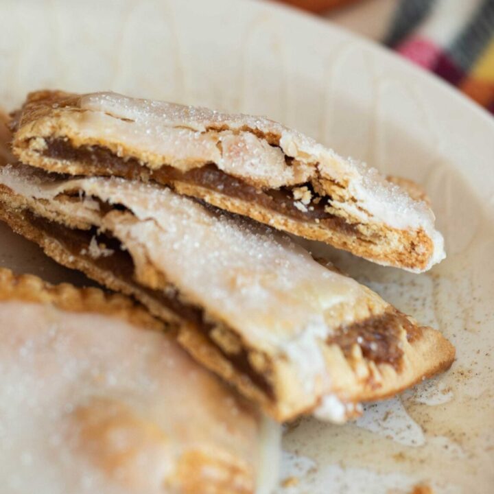 Pumpkin Hand Pies with coffee cup and flannel scarf