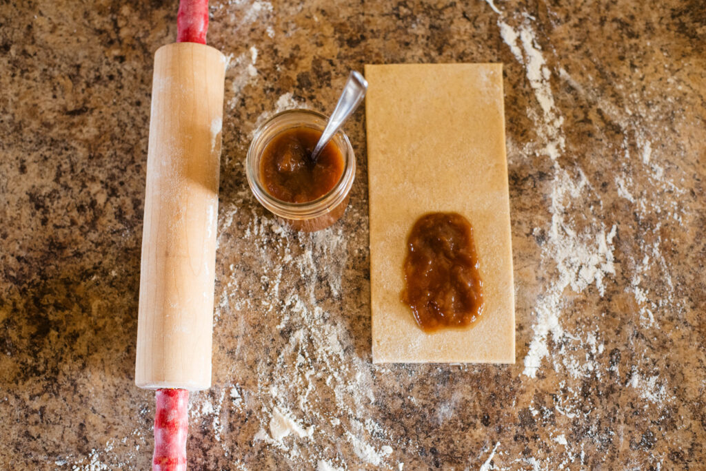 Filling spread on hand pie dough