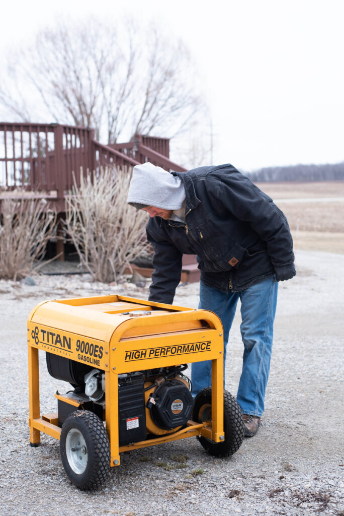 Man starting a generator