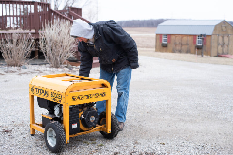 Man starting a generator