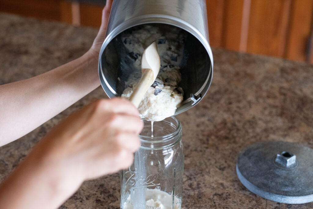 Ice cream scooped into Mason jars.