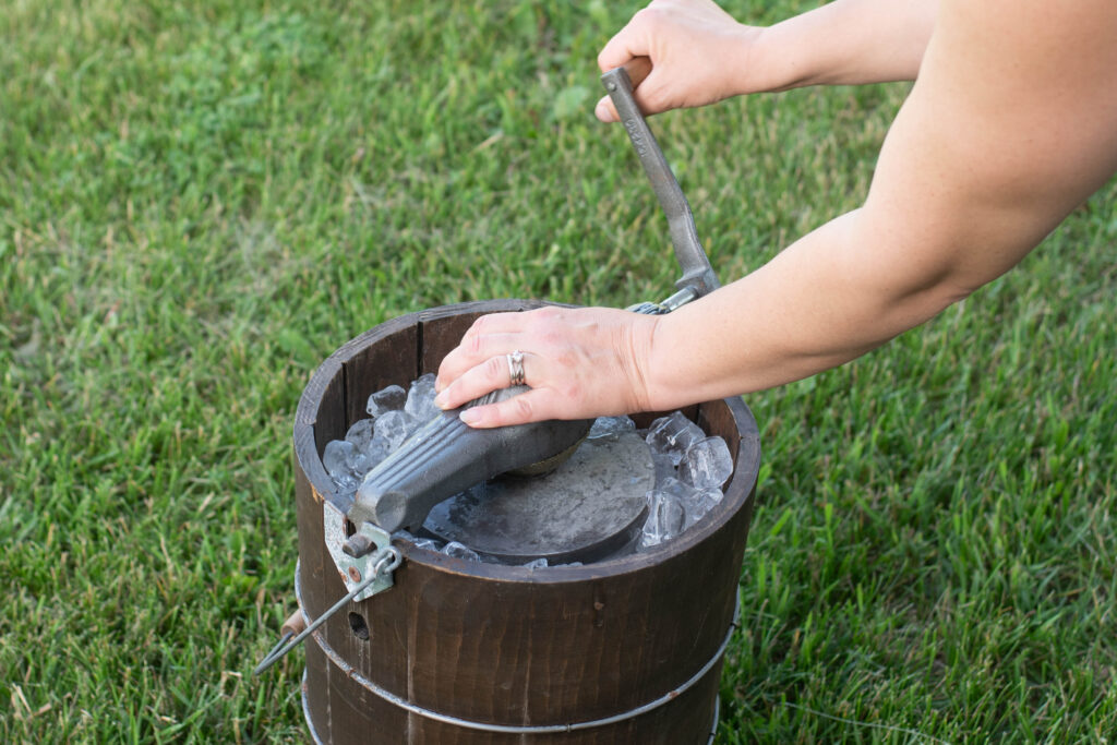 Woman turning a handle 