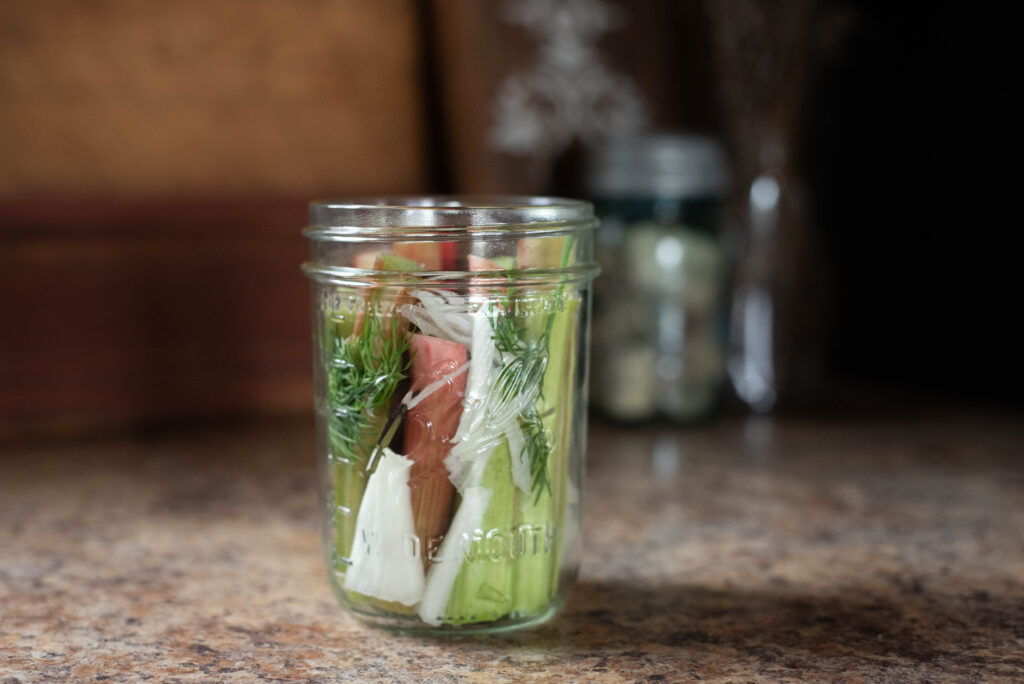 Rhubarb, fresh dill and onions packed tightly in pint jar