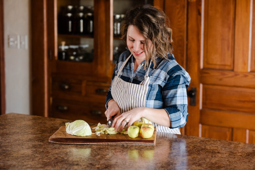 Woman chopping a salad