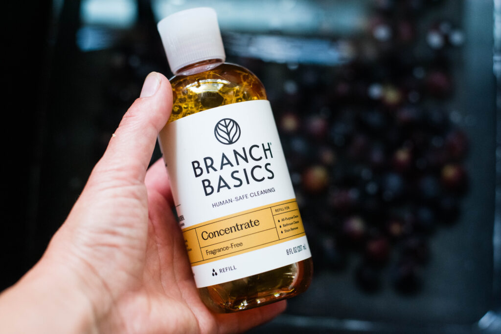 Grapes being washed with Branch Basics soap.