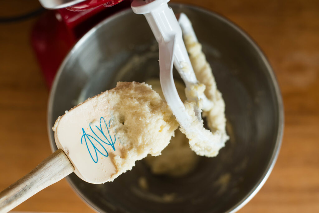 Wet ingredients of cookie dough mixed together to be light and fluffy