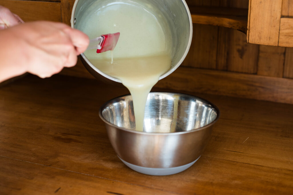 Freshly melted white chocolate chips and heavy cream for ganache