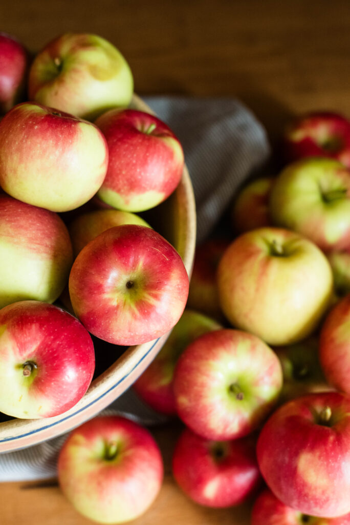 Antique bowl with fresh apples.
