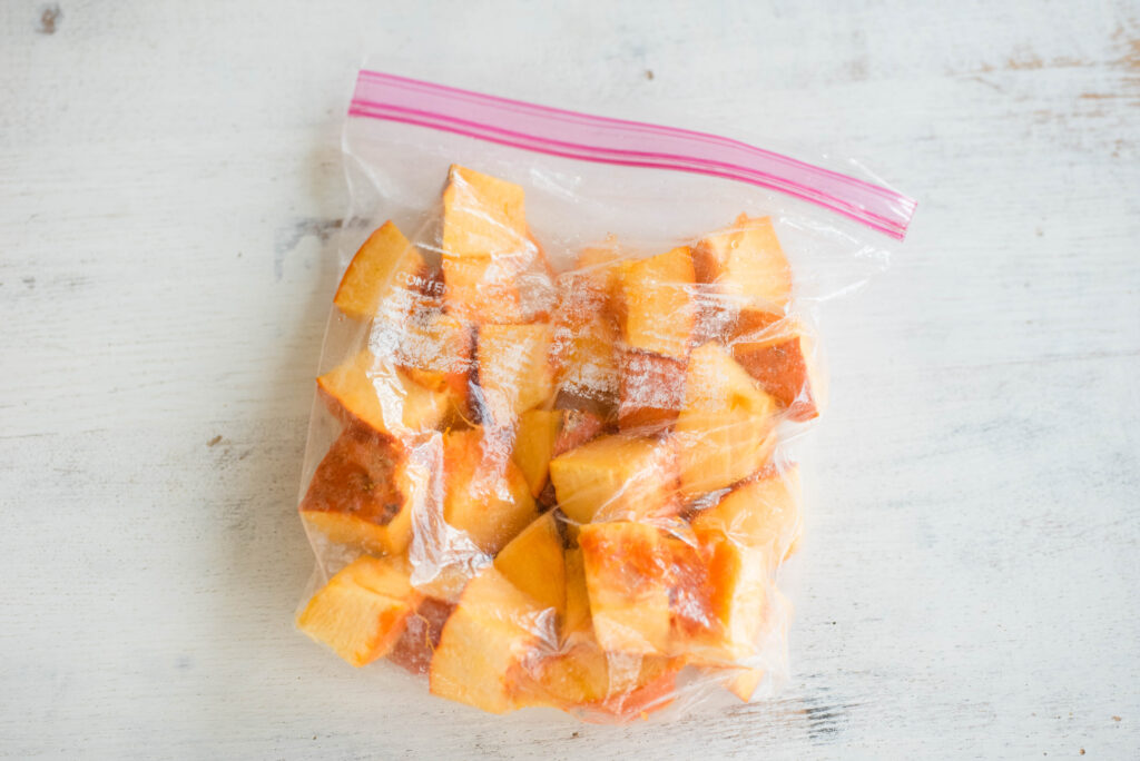 Cubed fresh pumpkin in a Ziplock baggie.