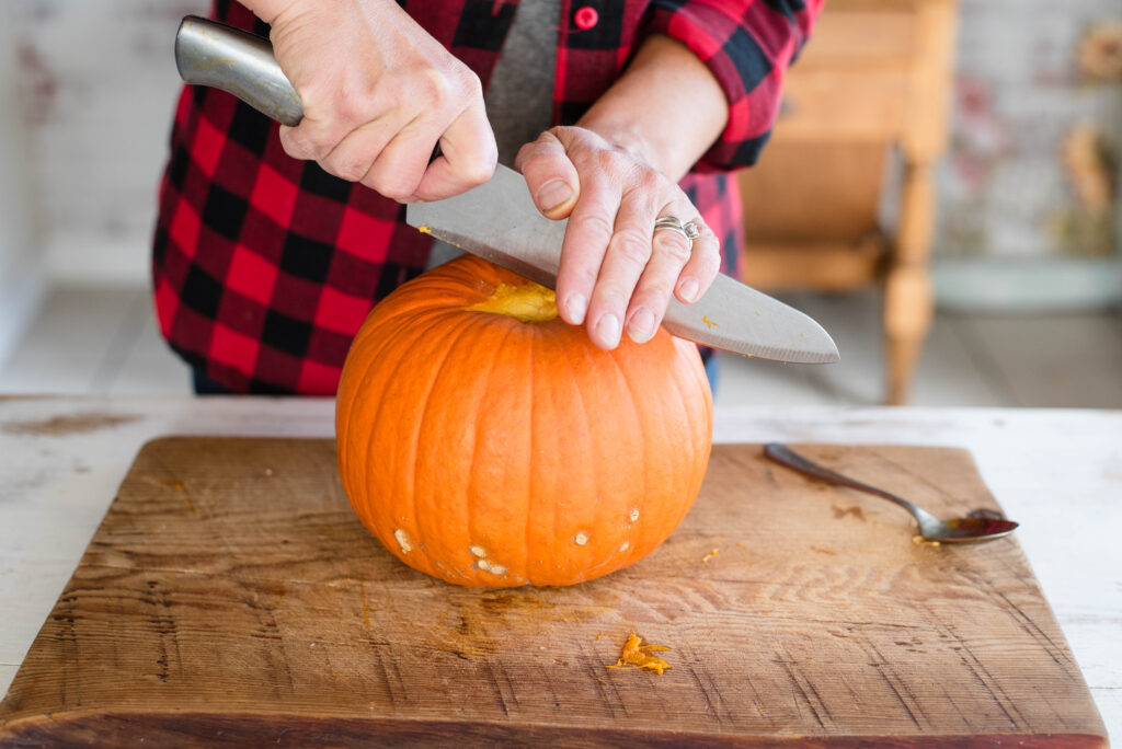 Knife cutting a pumpkin.