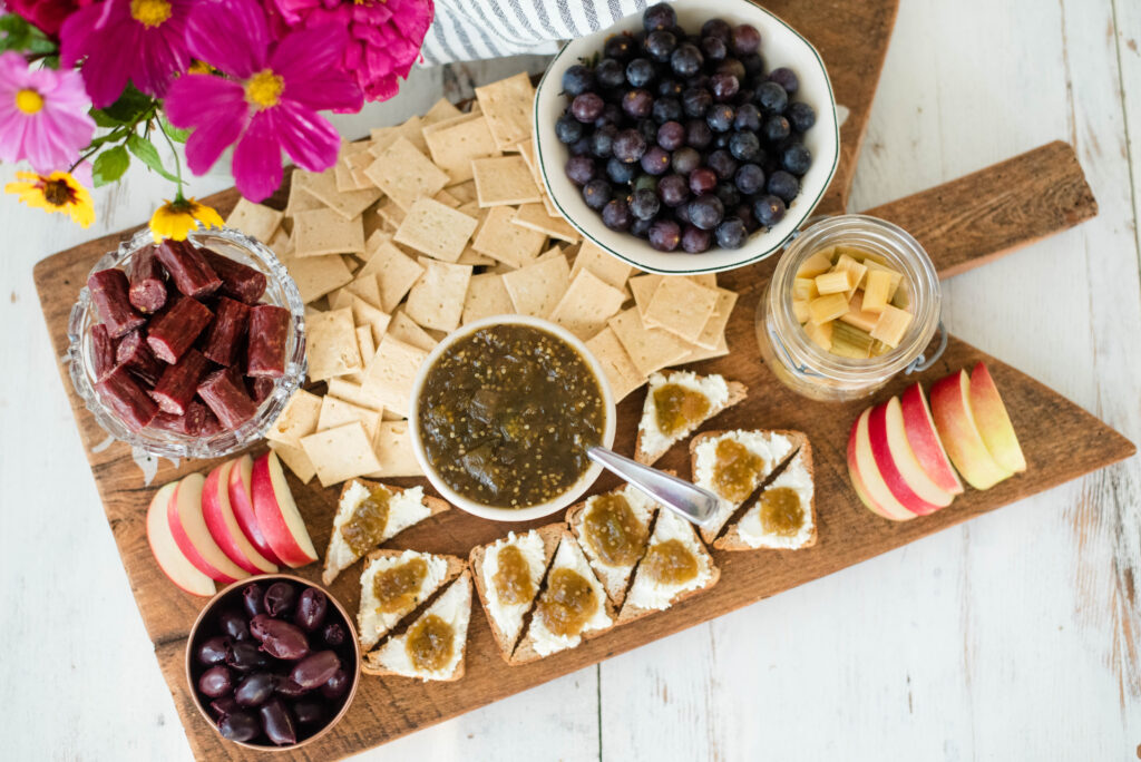 Tomatillo jam on a charcuterie board.