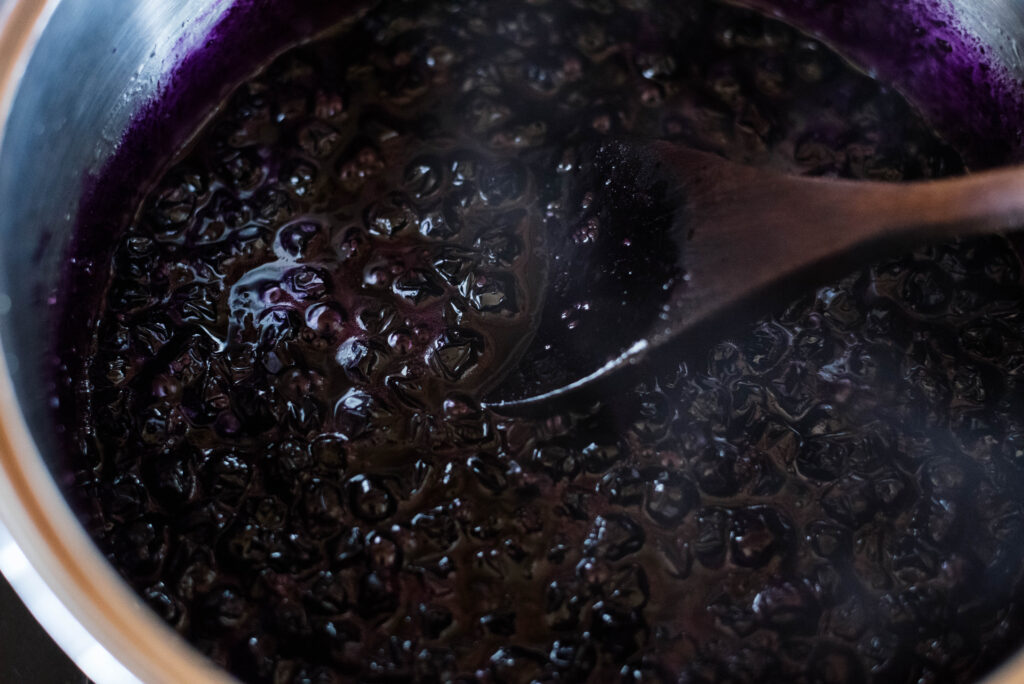 Huckleberry jam cooking.