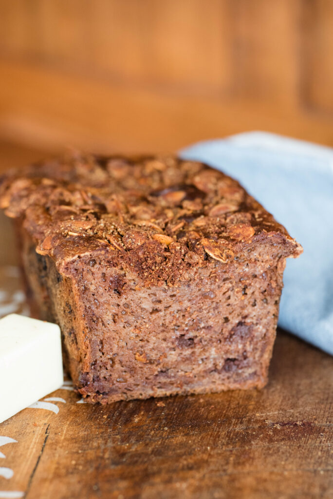 Gluten free banana bread resting on cutting board