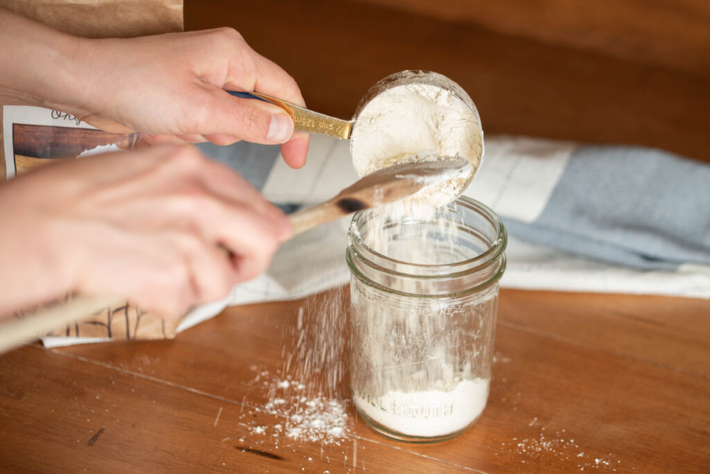 Flour measured into clean jar