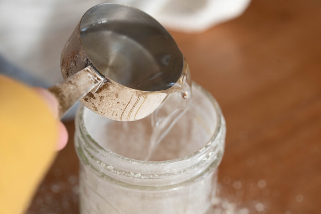 water pouring into jar