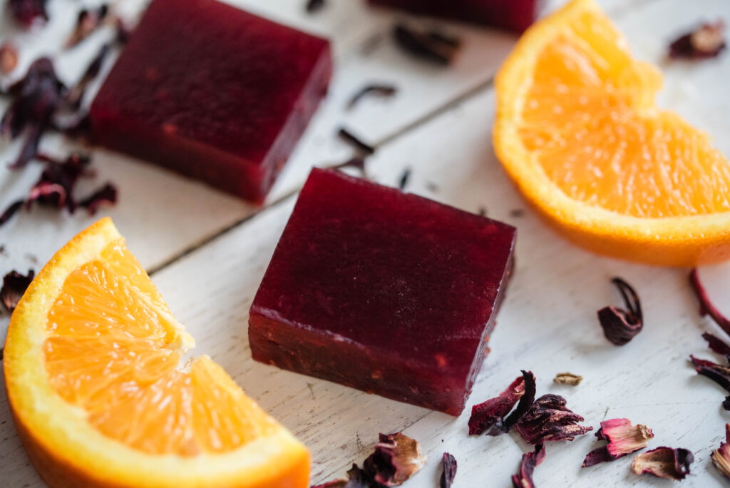 Homemade jello with raspberry jam, oranges and hibiscus
