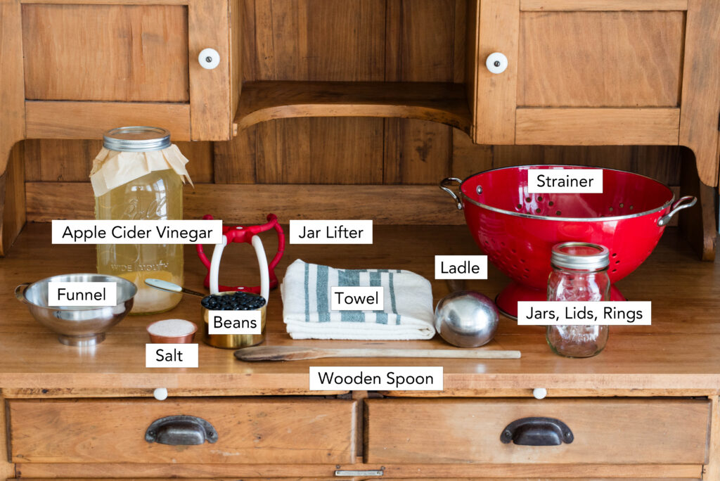 Ingredients and equipment needed for pressure canning dried beans