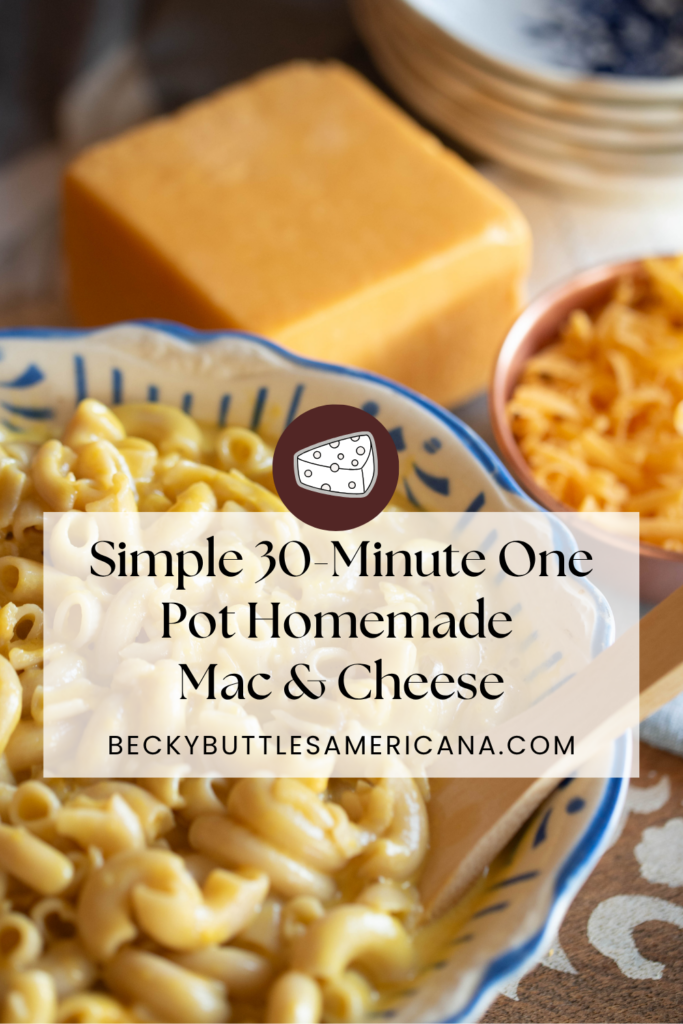 Homemade mac and cheese with shredded cheese