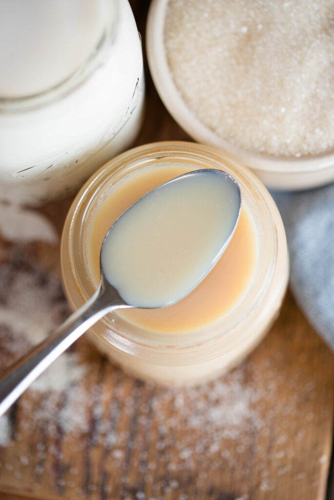 A spoonful of homemade sweetened condensed milk.