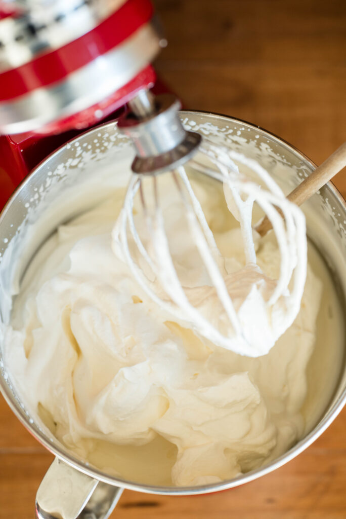 Whipped cream for homemade vanilla ice cream.