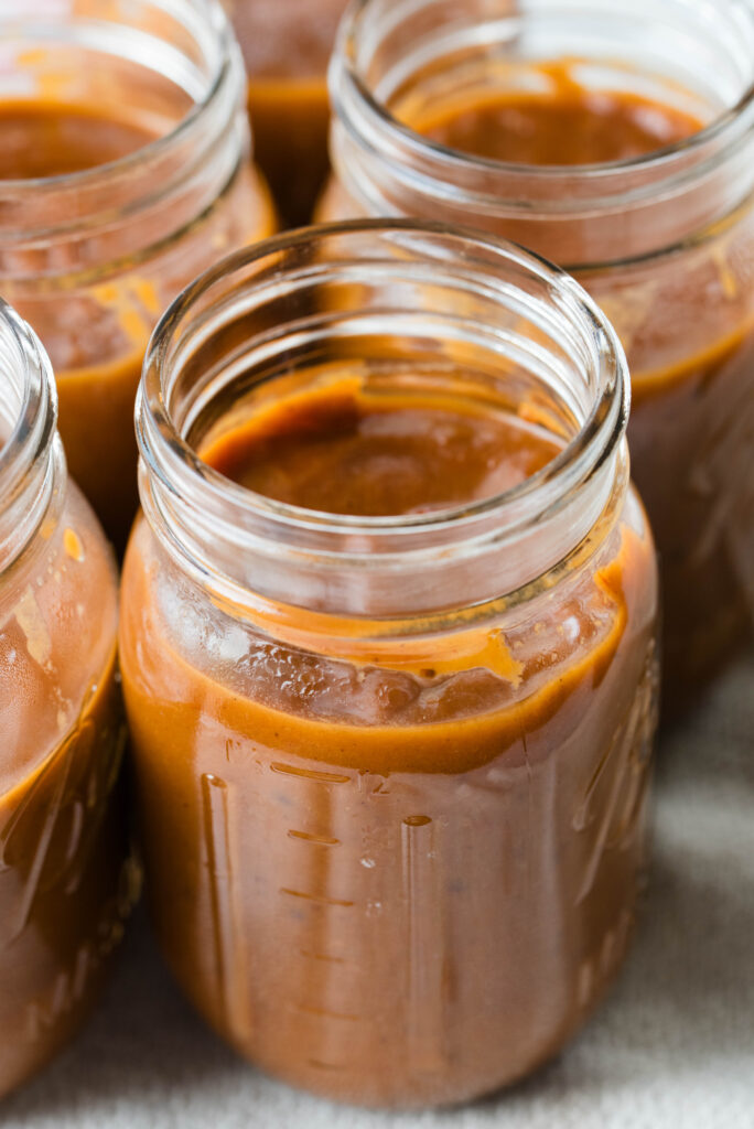 Jars of homemade barbecue sauce with rhubarb