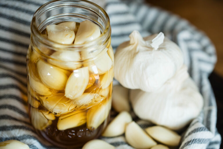 Jar of honey fermented garlic.