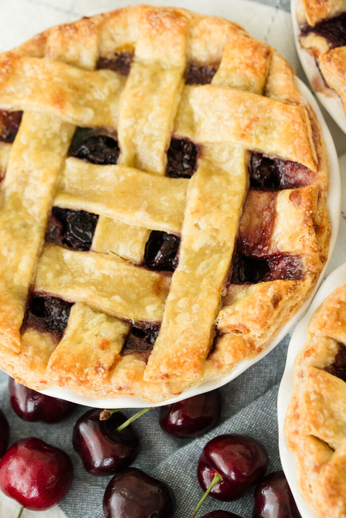 Baked sourdough door county cherry pies with a lattice top crust.