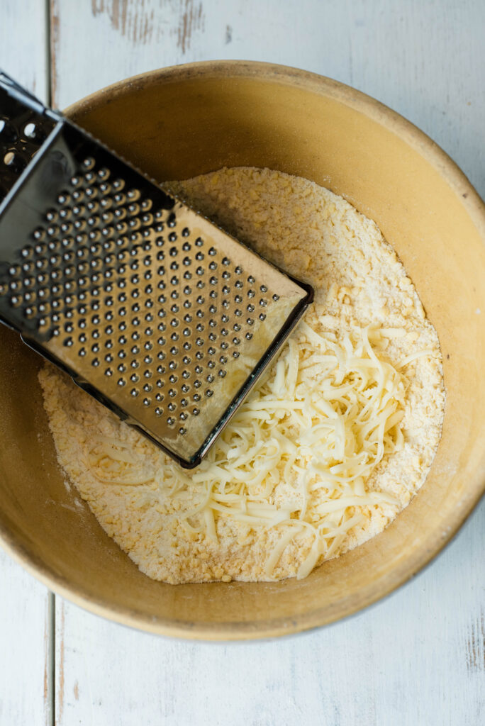 Cheese grated into dry ingredients for sourdough door county cherry pies.