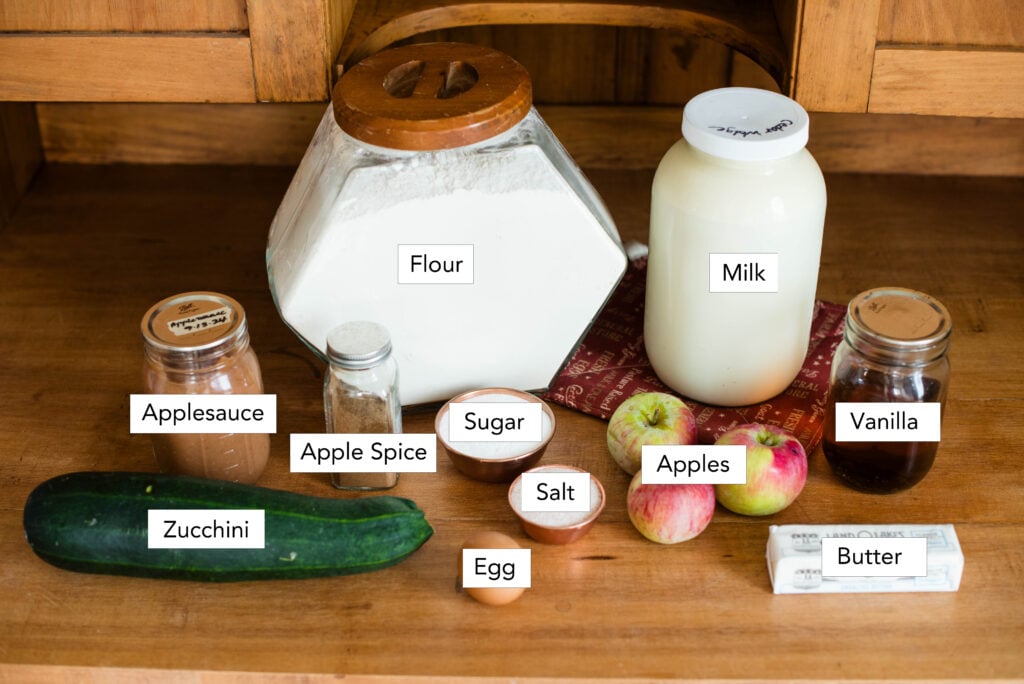 Ingredients pictured for apple spice muffins with zucchini.