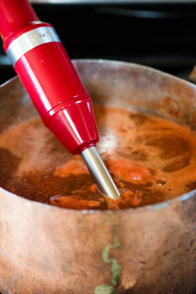 Pasta sauce pureed in a saucepan.